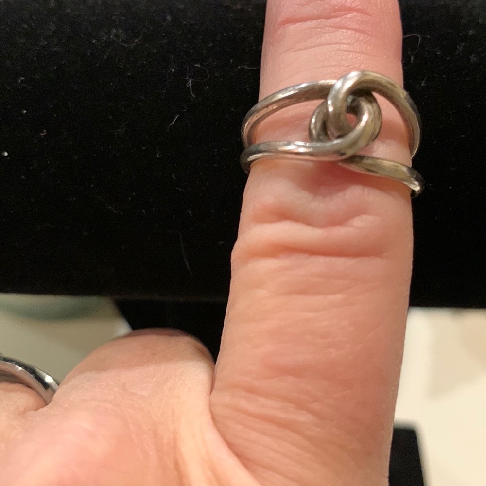 EUC Silver love knot ring